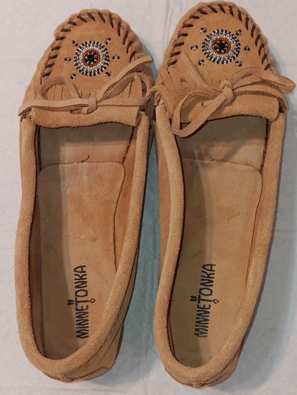 Minnetonka Beaded Me To We Suede Moccasins in Tan. 11